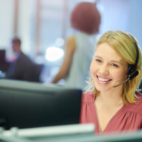 A Fort worth Couriers Customer Service Rep answer the phone helping a client. 