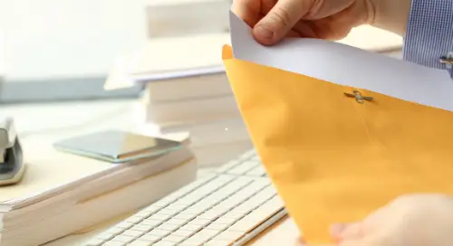 Person opening a document after delivery